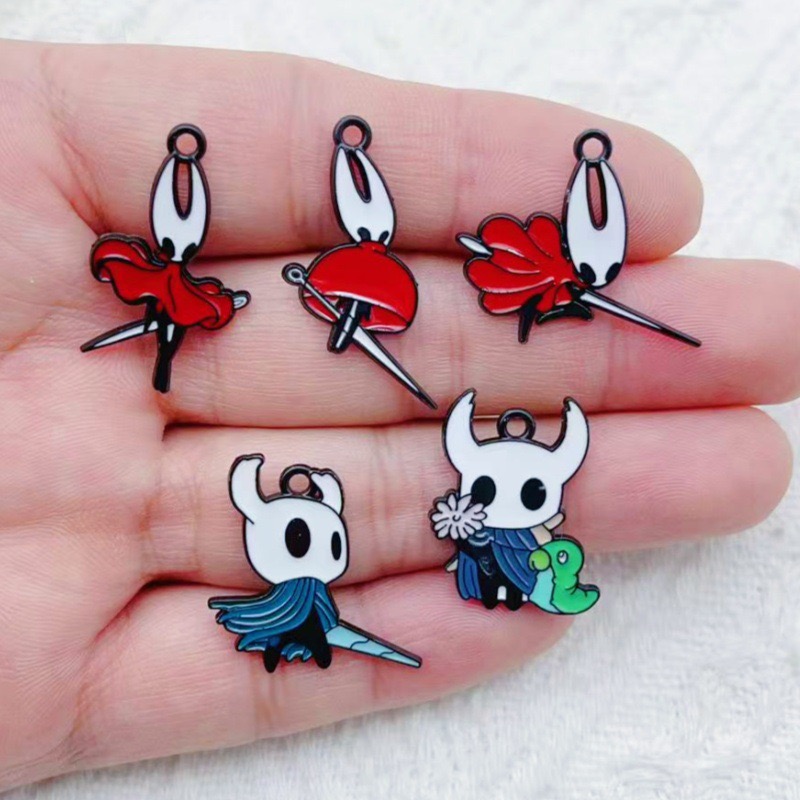 10 pendentifs en alliage motif - Earrings avis et prix